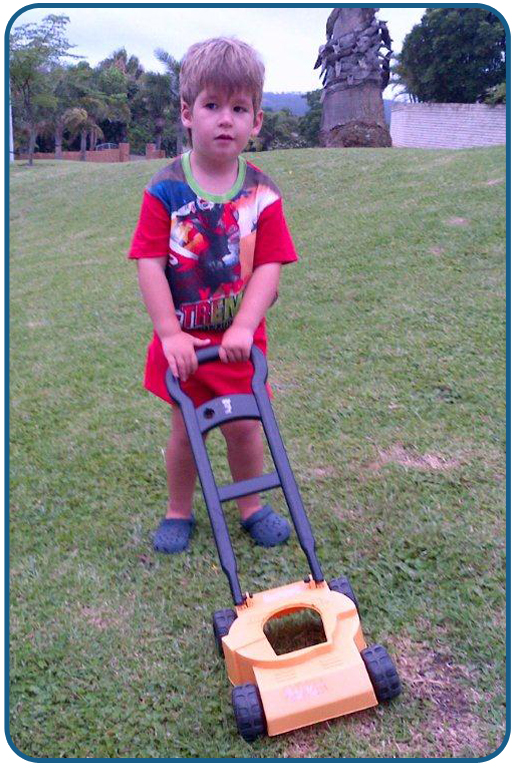 Dale and the mower, his  favourite in the garden.